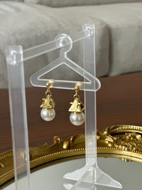 Gold Dangling Pearl Earrings