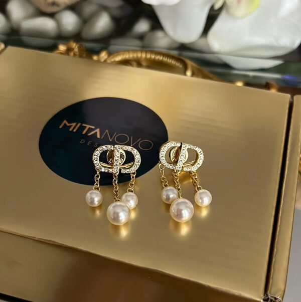 Gold Dangling Pearl Earrings with Stone